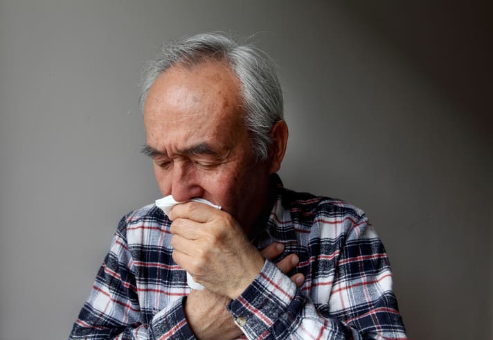 TLC Your Way Home Care Services | York County, Marion County, Florence / Darlington County | older man coughing into napkin